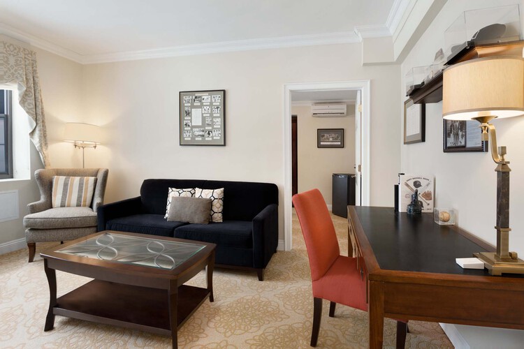 Executive Super Suite living area with work desk